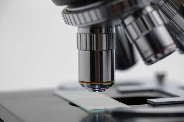 A profile close up of a microscope